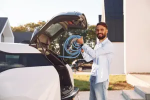 taking-ev-charging-wire-from-the-truck-2023-11-27-05-29-32-utc.webp.webp